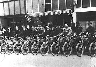 http://www.open.org/~library/historic/09536bab.html

A line of motorcyclists show off their bikes in front of the City Bicycle Hospital in Portland.  RECORD NO.~9002.  DATE ~1910.  COLLECTOR ~Mr. Ben Maxwell  Salem Public Library.