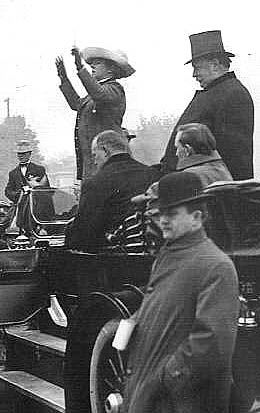 President William Howard Taft visited Salem in October 1911.  He is standing in a touring car in downtown Salem with Secret Service agents and police patiently listening to the music the band conductor is leading.

Photographer unknown.  From the Ben Maxwell Collection, Salem Public Library.  IMAGE FILECODE: B705154B.JPG