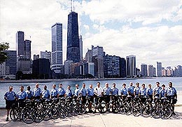 Sergeant Joseph Andruzzi, Jr. and members of the Chicago Police Department Bicycle Patrol Unit at Lake Shore Drive on Chicago's Gold Coast.  The unit was established in 1992 and since then has been operating primarily along the 26 miles of lakefront bike paths. Each year they patrol large-scale events such as the Taste of Chicago and they provide an escort for the Chicago Marathon.  They have also been used for special events such as the Long After Twilight Ends (L.A.T.E.) Ride which occurs each July.